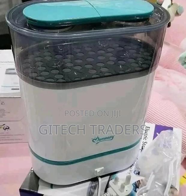 Momeasy Electric Steam Sterilizer. Fits Six Bottles