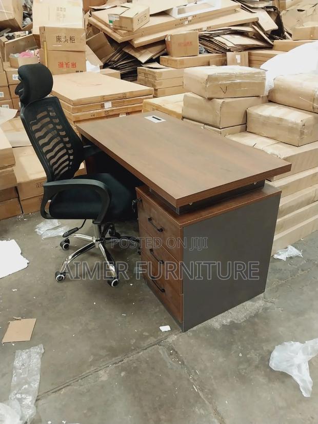 Brown Office Table and Headrest Chair