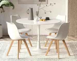 Sleeky Eames Dinning Table and 4 Chairs.