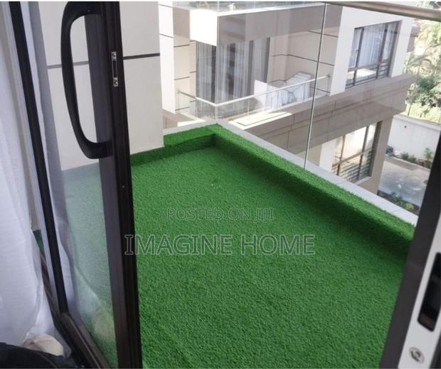 Green Grass Carpet at Home Balcony Space