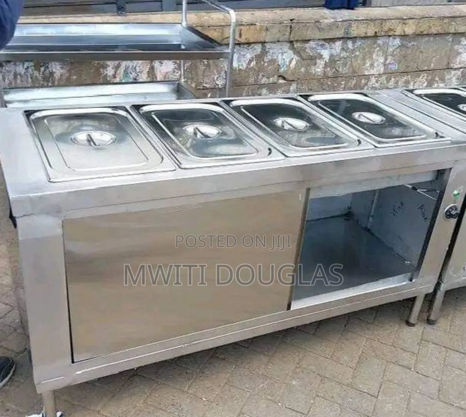 High -Tech Stainless Food Warmer With a Cabinet Underneath