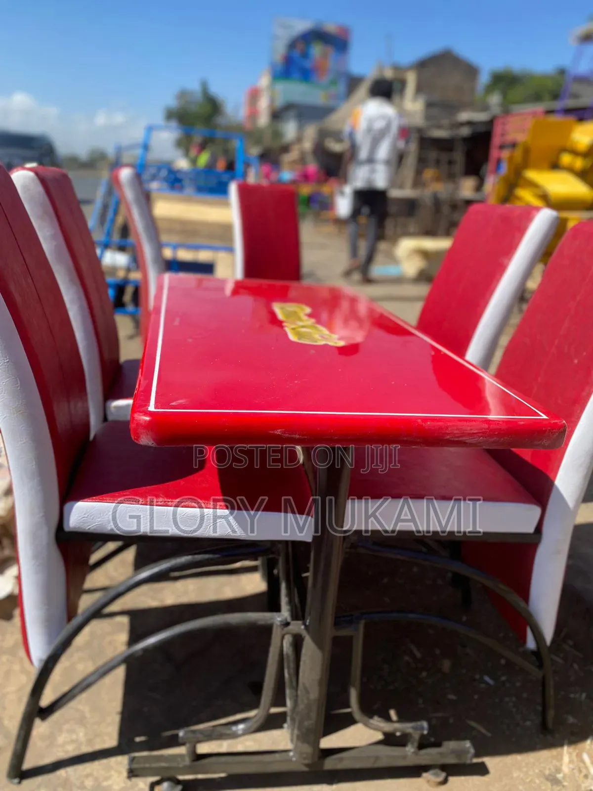 Red Executive Chairs With White Strip and Table
