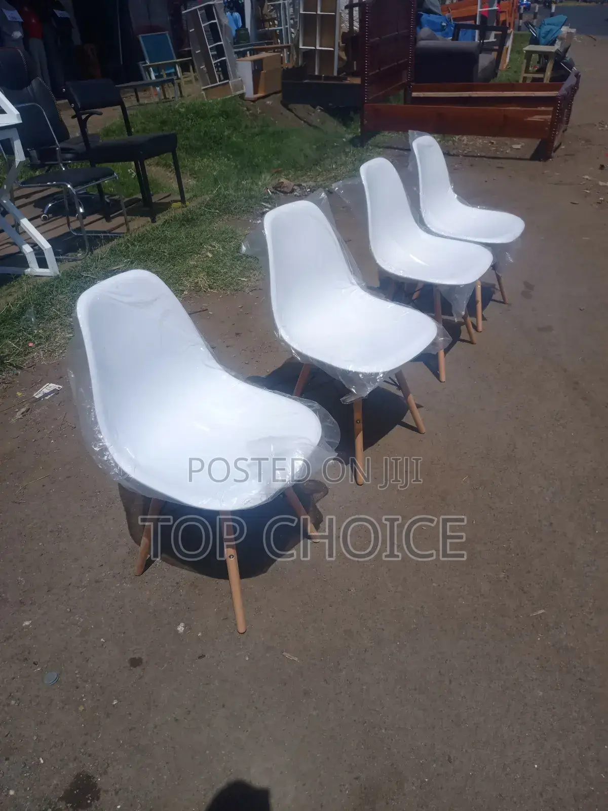 White Plastic Aemes Style Chairs
