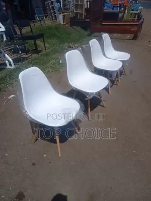 White Plastic Aemes Style Chairs