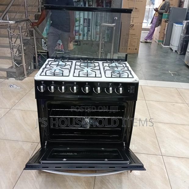 Efficiency and Power:Sarahtech 6-Burner Gas Cooker in Action - main view