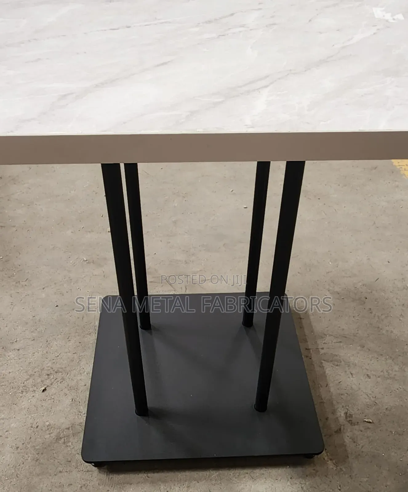 Cream Marble Look Table With Powdercoating Finish.
