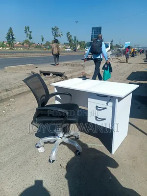 Office Desk and a Mesh Chair. ,