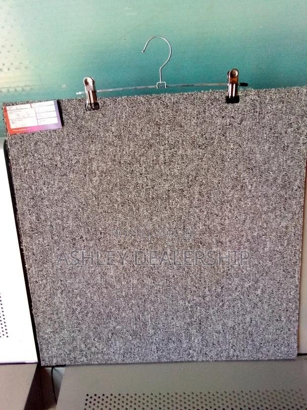 Improved Carpet Tiles