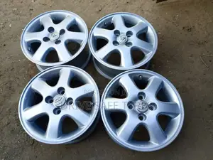 14 Inch Toyota N. Z. E Silver Sport Rims Set