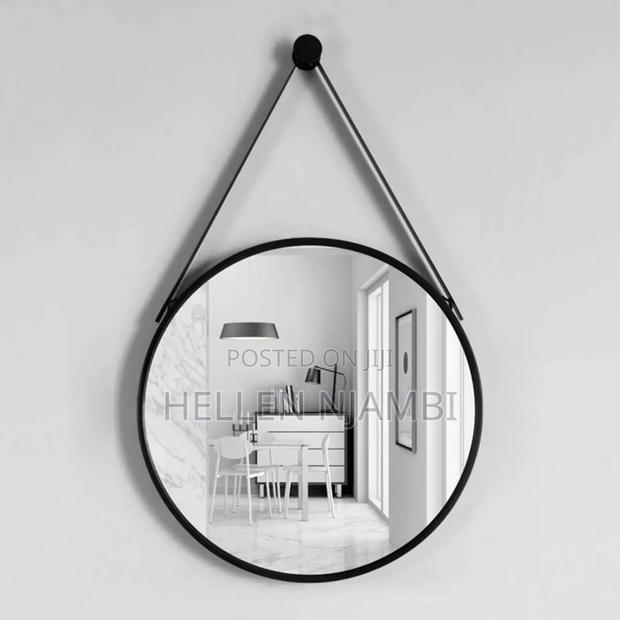 Round Hanging Mirror With a Strap