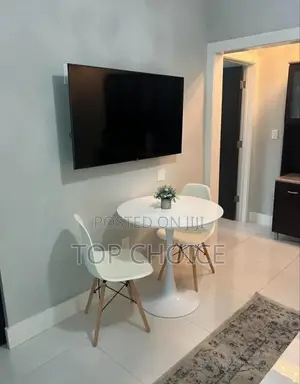 White Round Outdoor Table and Chairs