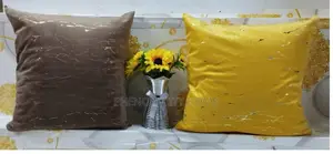 White and Black Decor Pillows With Gold Patcjes