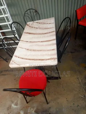 Six Seater Dining Set With a Marble Top Table for an Hotel