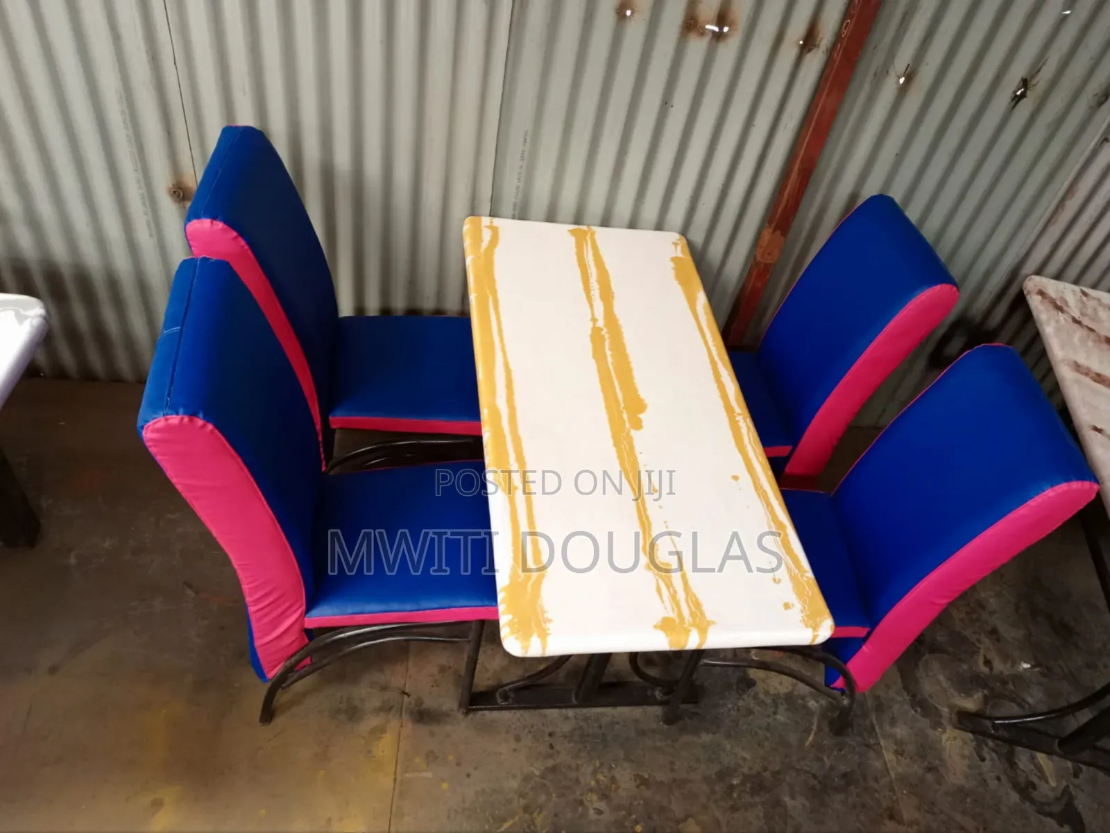 Bluish Complete Dinning Set With Four Chairs and a Table