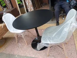 Black Table and Aemes Chairs