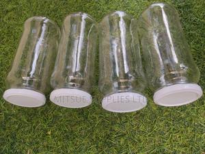 A Set of 12 Glass/Spice Jars 580ml Long With Black/White Lid