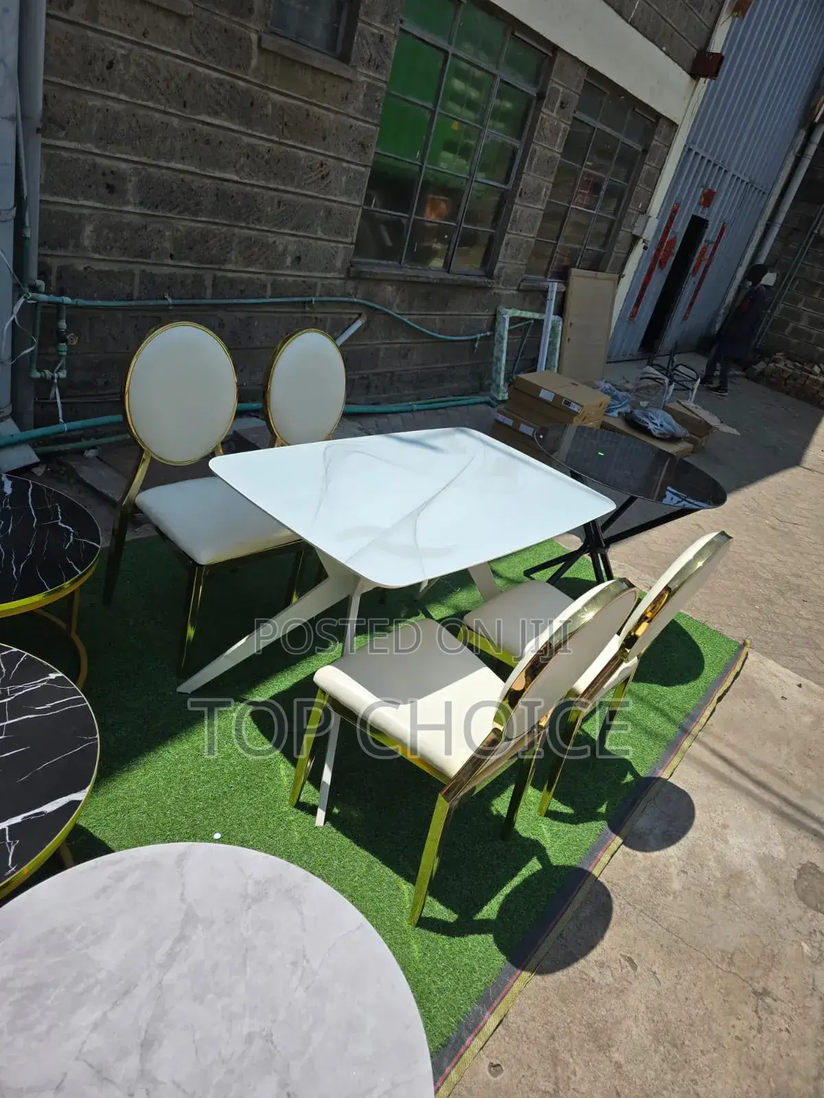 Four Seater Dinning Table and Chairs (Gold Stand).