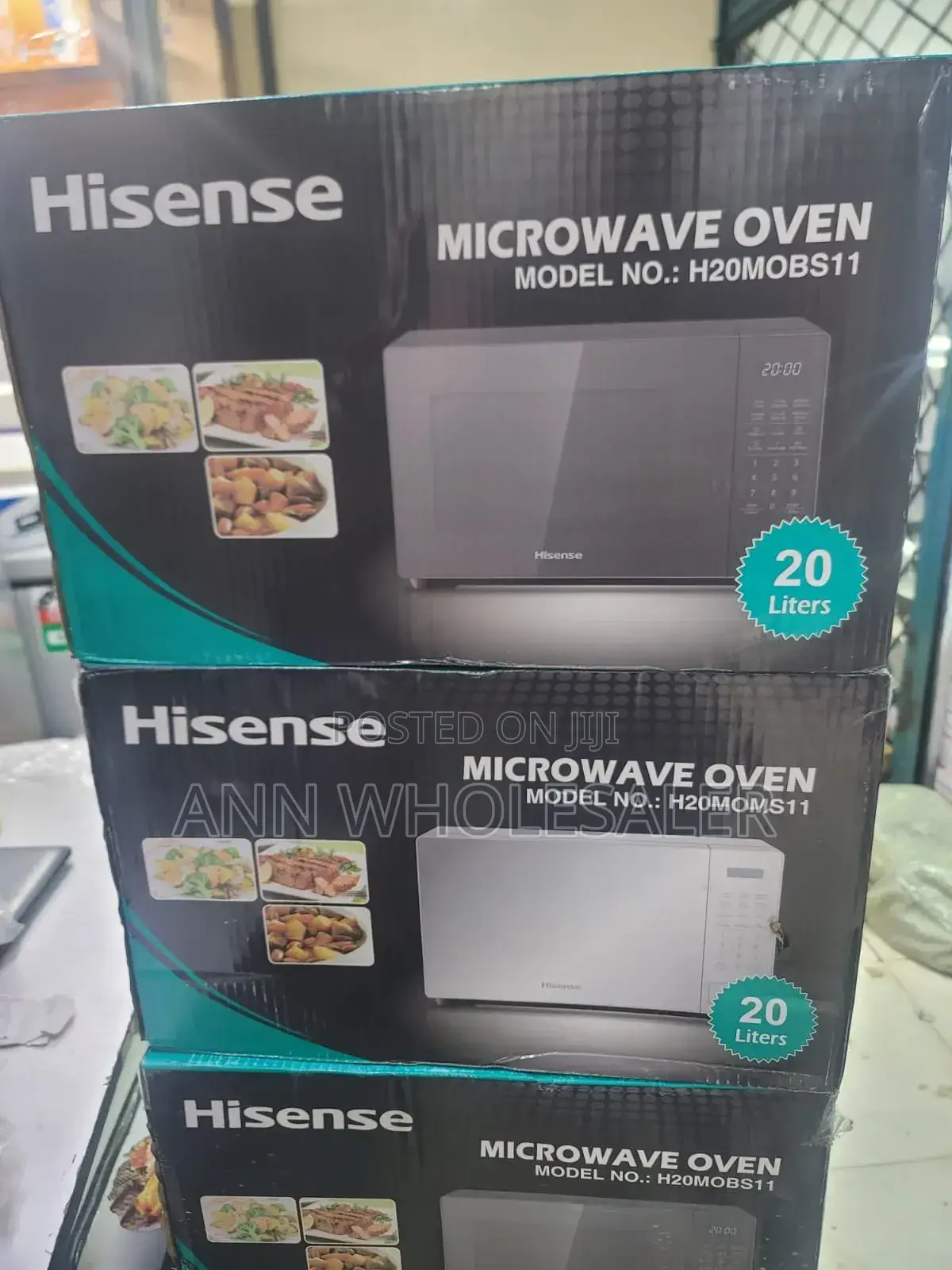 Silver and Black Hisense Digital Microwave H/76