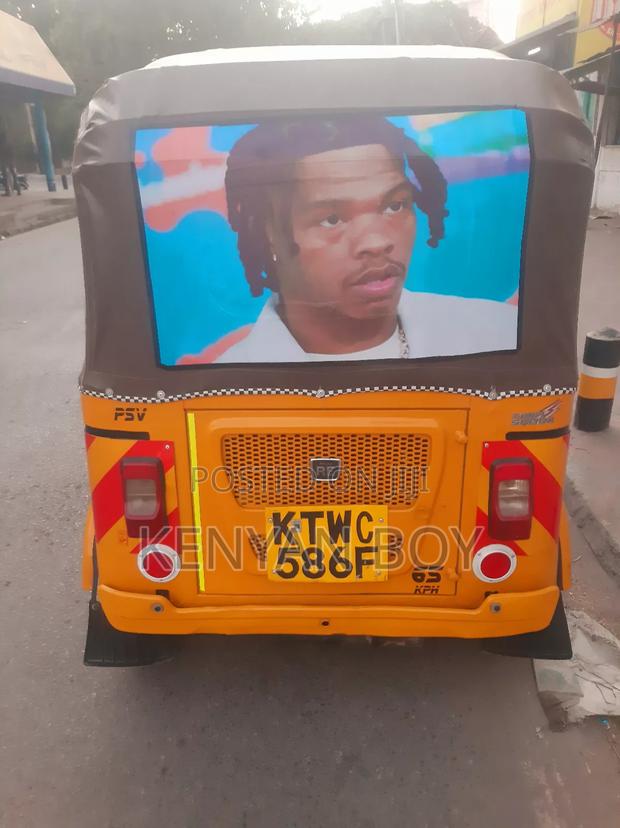 Bajaj RE 2021 Yellow - thumbnail 3