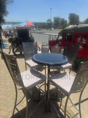 Restaurants And Bar High Grey Chairs And High Round Table