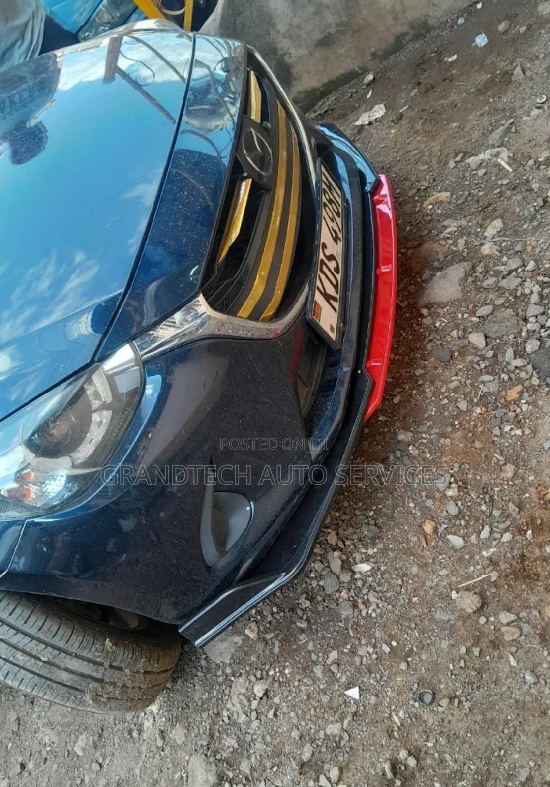 Black Red Bumperlip on Mazda 2/Demio