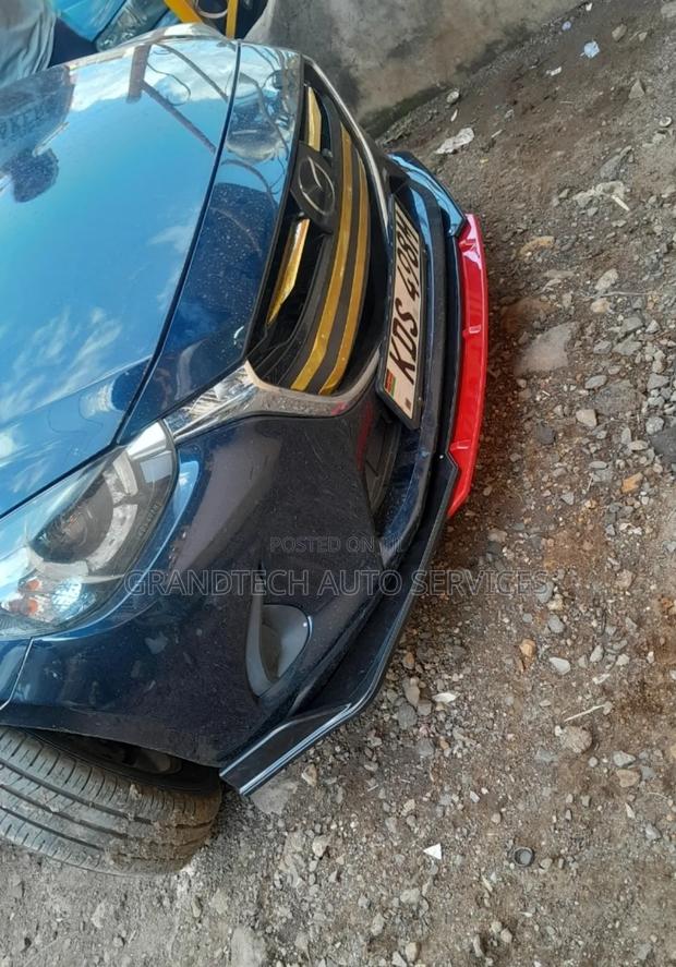 Black Red Bumperlip on Mazda 2/Demio