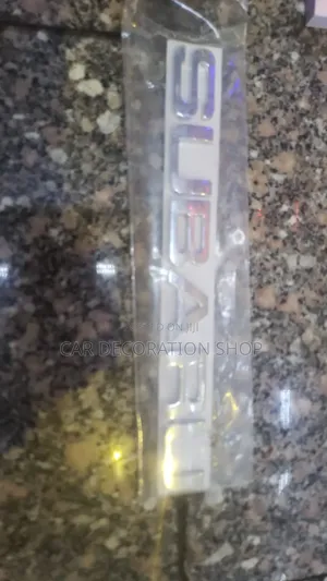 Chrome Subaru Letter Badge