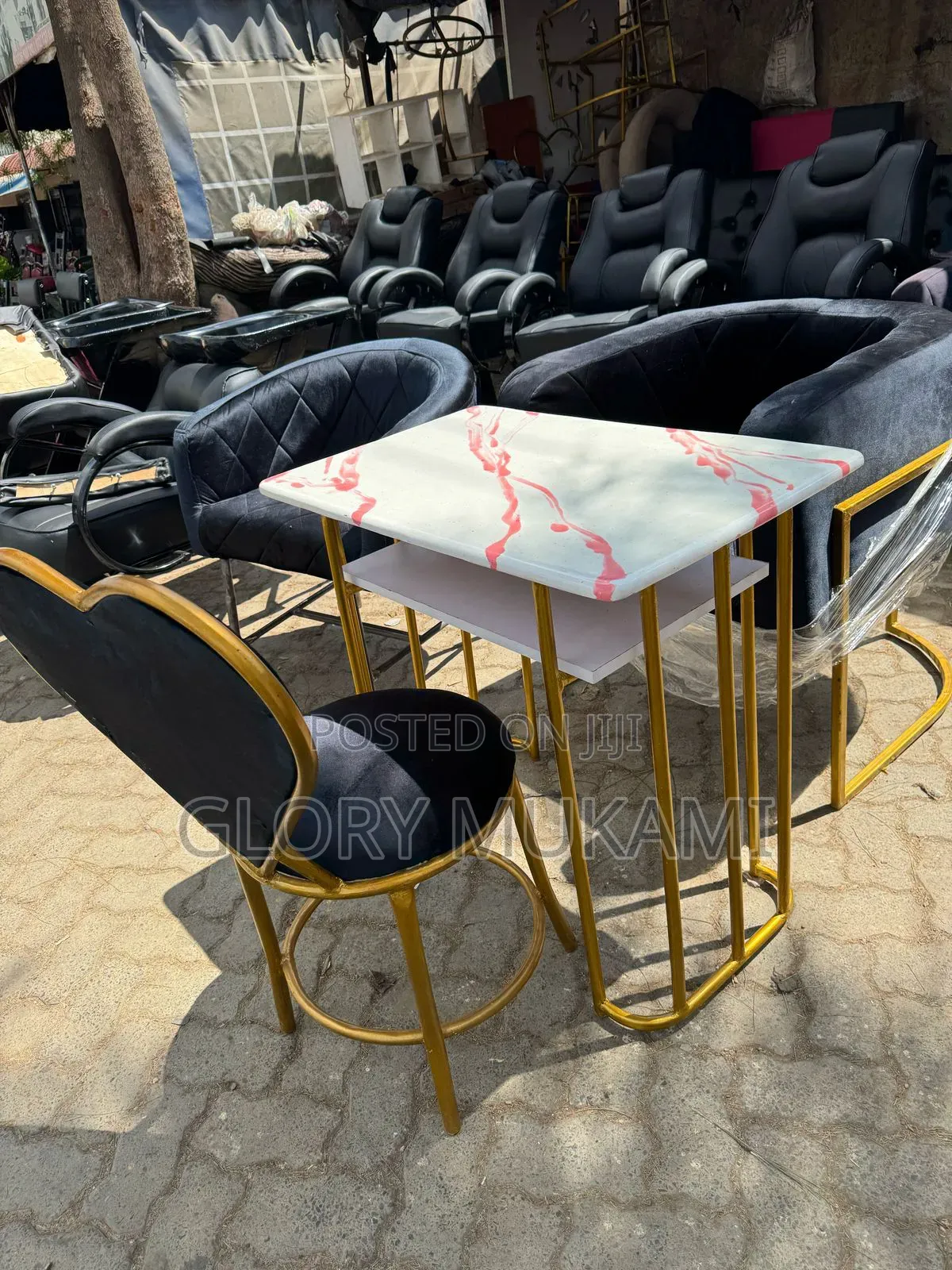Black Set Manicure Chairs And Marble Table