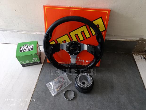 Momo Racing Steering Wheel + Boss Kit Adapter