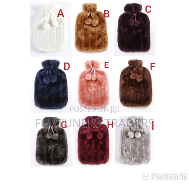 *Hot Water Bottles With Faux Fleece Covers.
