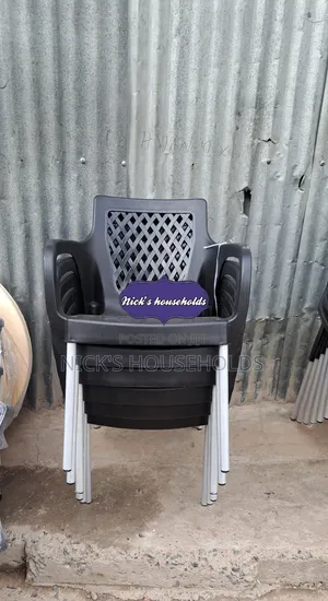 Chair With Metal Legs and Black Plastic Backrest