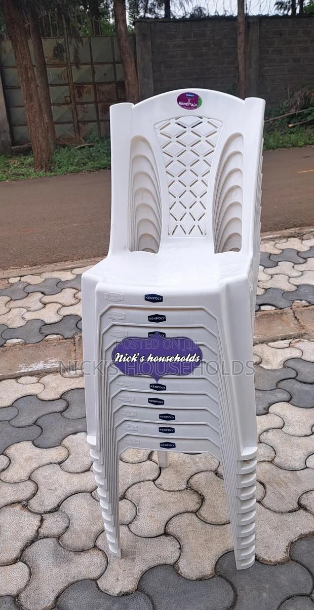 White Armless Plastic Chairs - main view