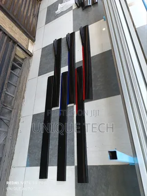 Sleek Black Side Skirts With Red Blue Highlights
