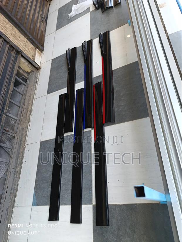 Sleek Black Side Skirts With Red Blue Highlights