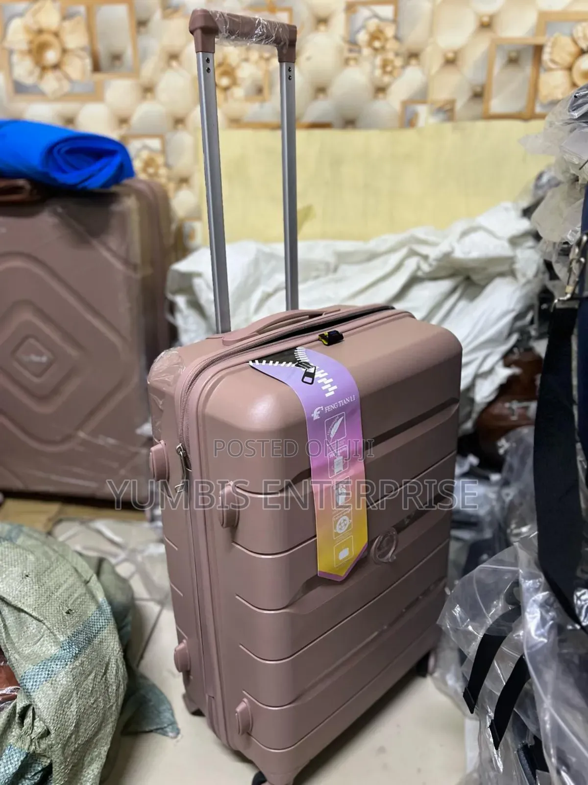 Pink 1 Piece Medium ____Rubber____suitcase at 4000 Kes
