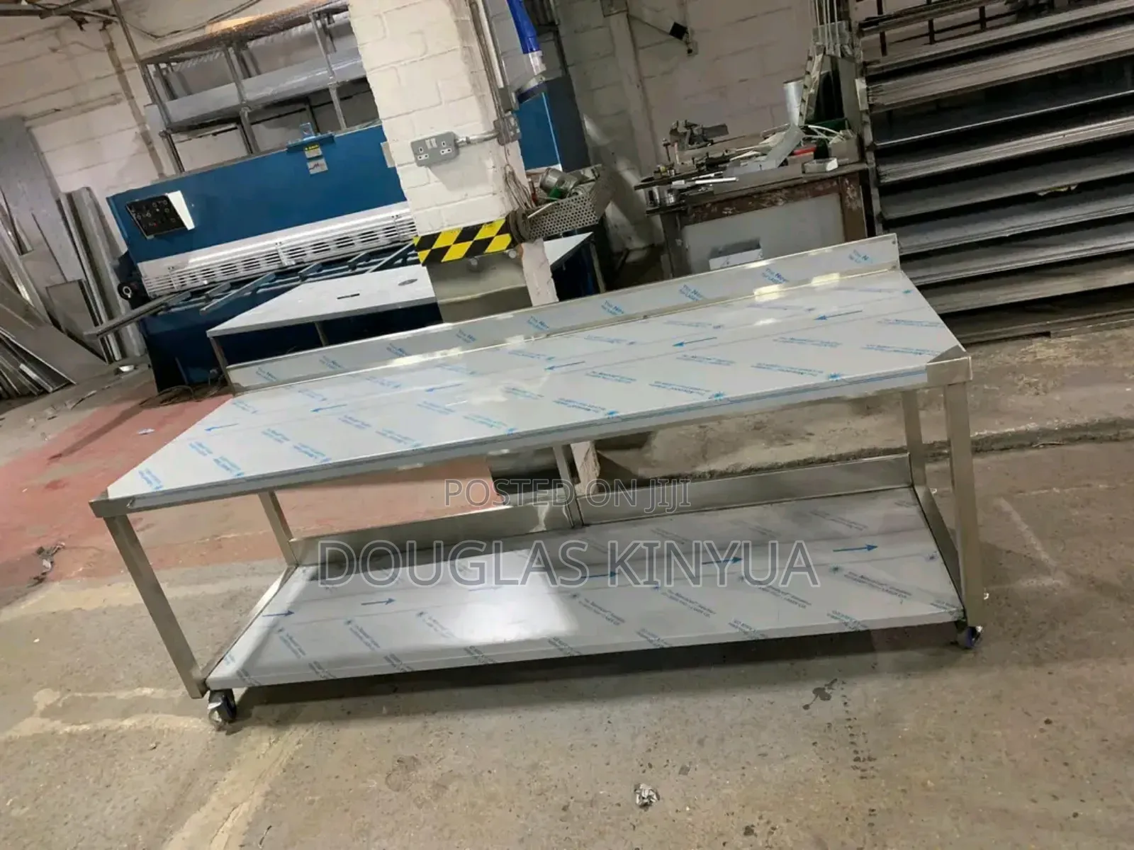 Moving Stainless Steel Working Table.