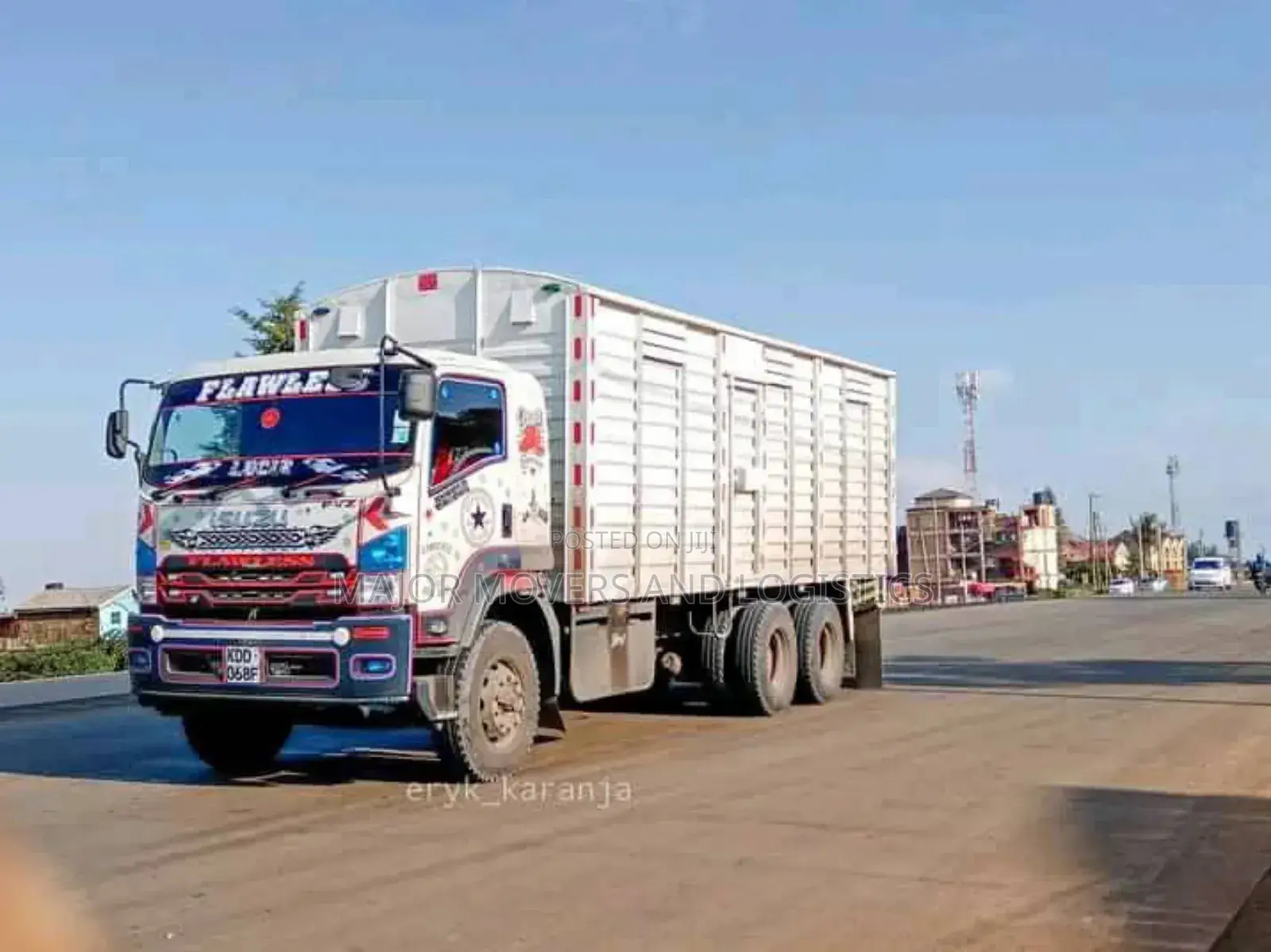 Mguu Kumi. Trucks at Hand for Transport.