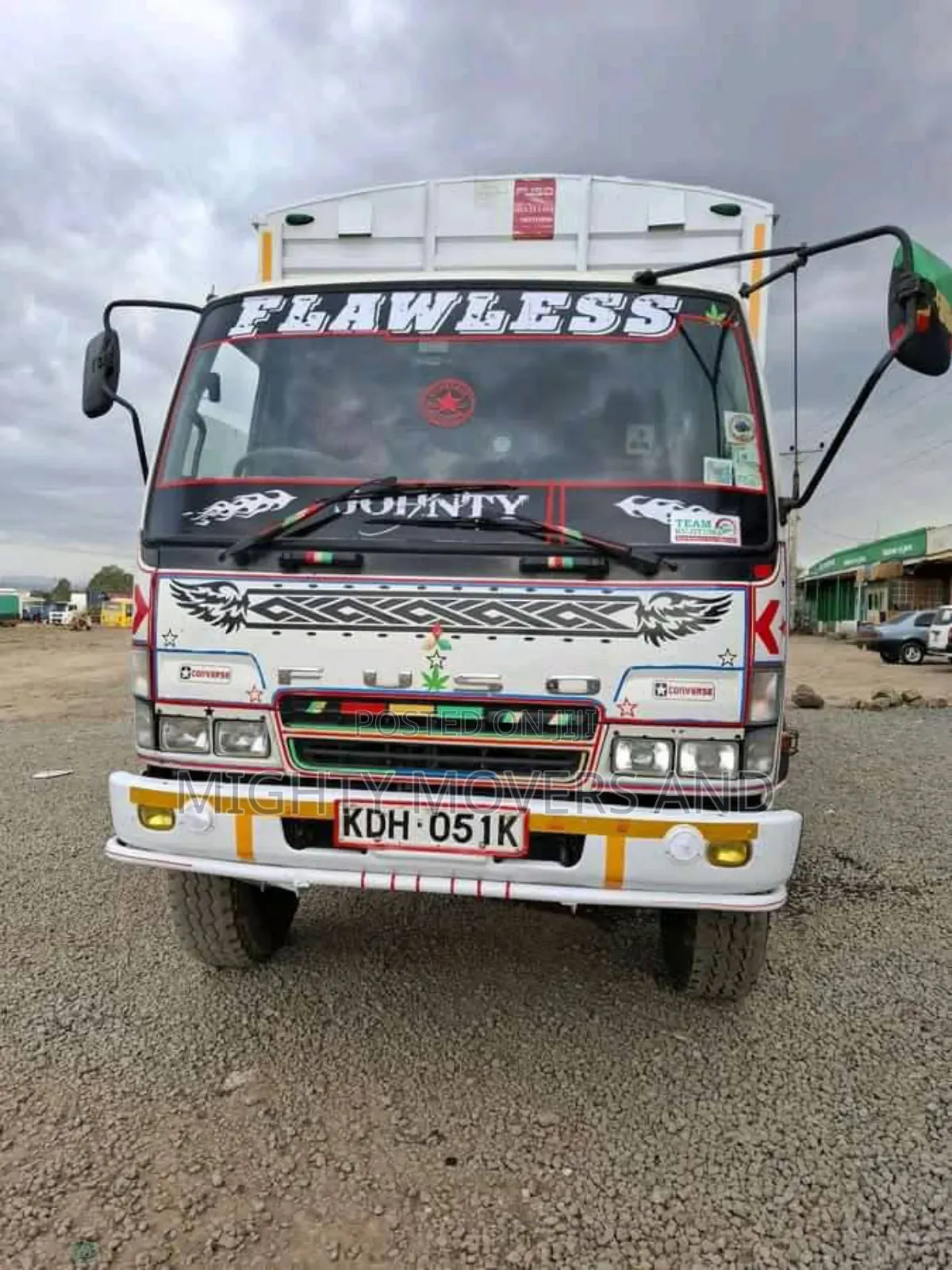 Mguu Kumi. Trucks at Hand for Transport.