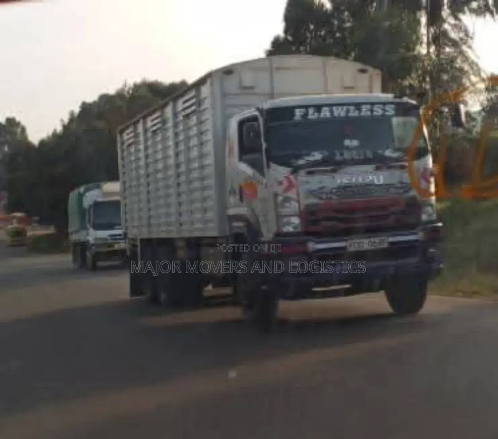 Mguu Kumi. Trucks at Hand for Transport.
