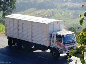 Mguu Kumi. Trucks at Hand for Transport.