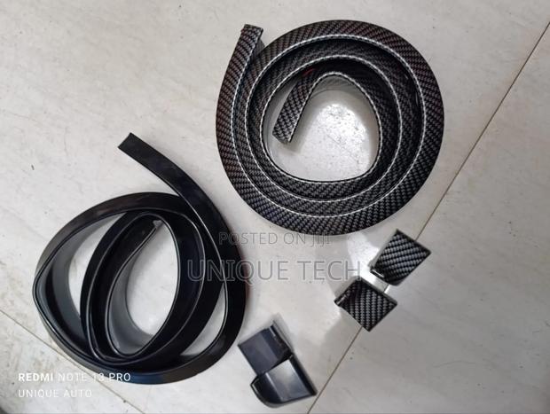 Universal Car Lip Spoiler – Black Rubber/Carbon Fibre