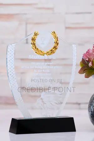 Glass Award With a Gold Tag