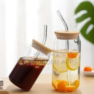 Glass Cup With Bamboo Lid and a Straw