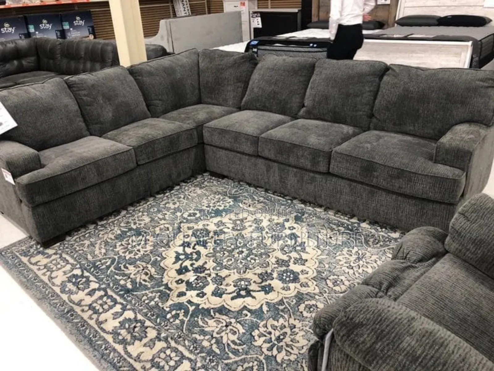 Black U Shape Couch With Throw Pillows