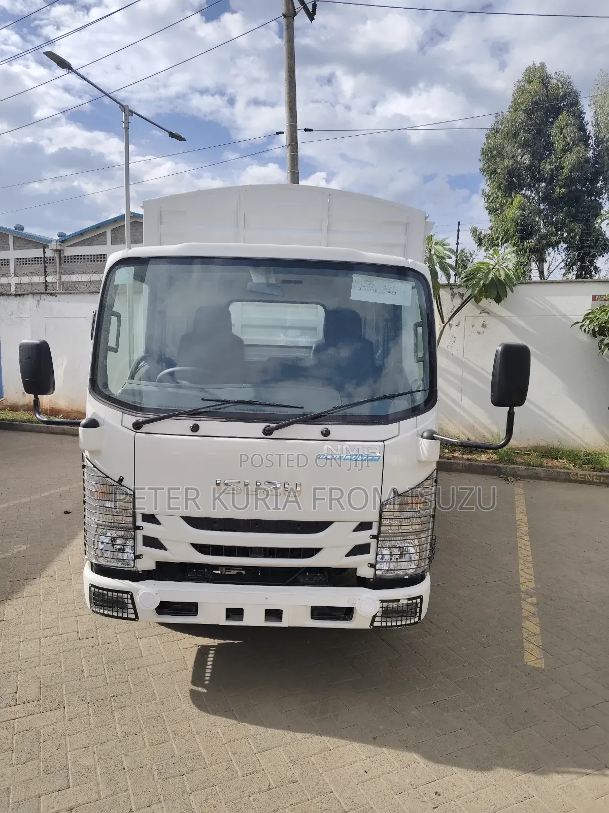 Brand New Isuzu NMR Blue Power