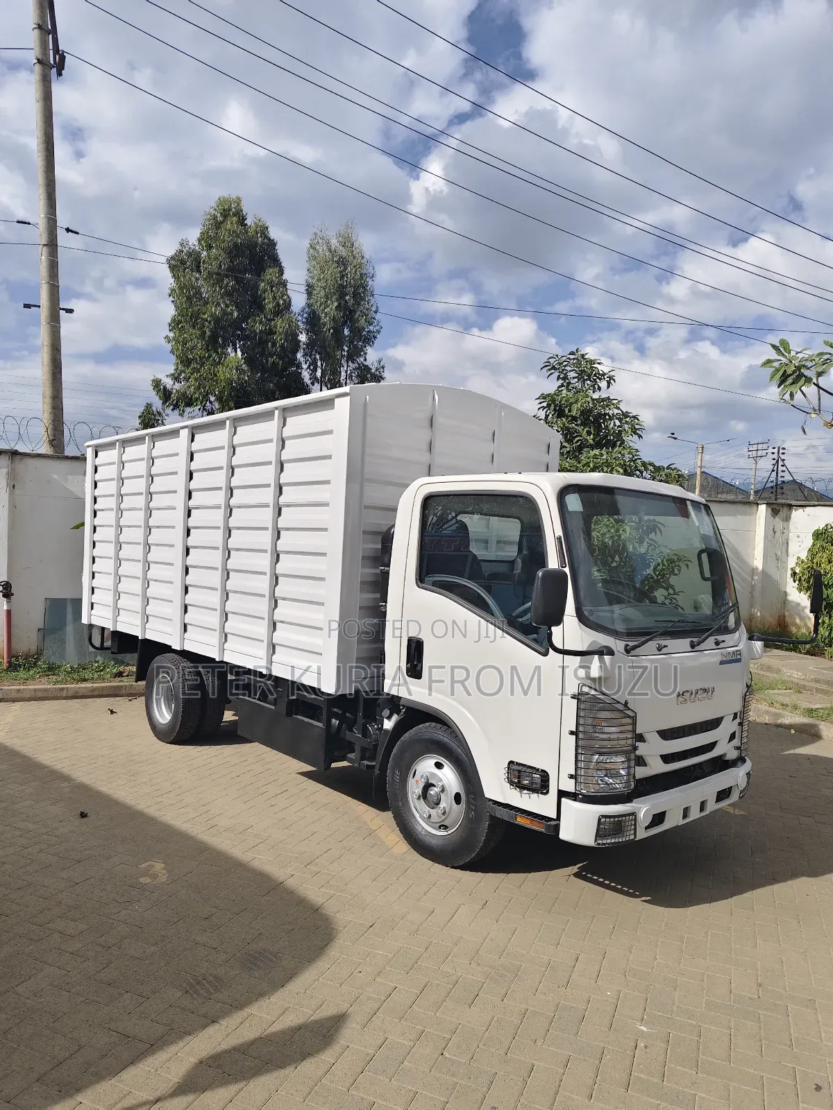 Brand New Isuzu NMR Blue Power