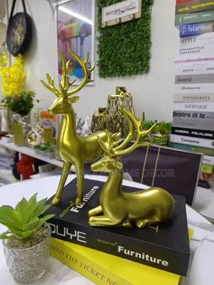 A Pair of Decorative Deers Resin Sculpture