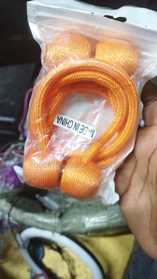 Orange Curtain Holders Available - main view