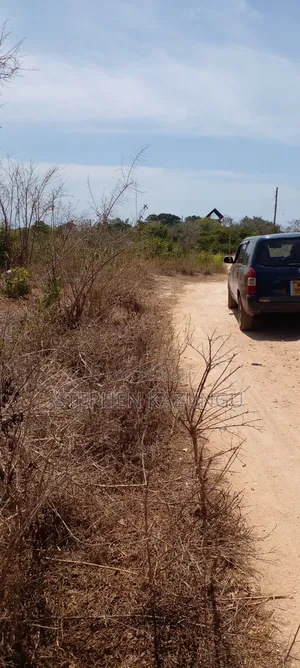1 Acre Half Plot on Sale in Galu Beach Zone.