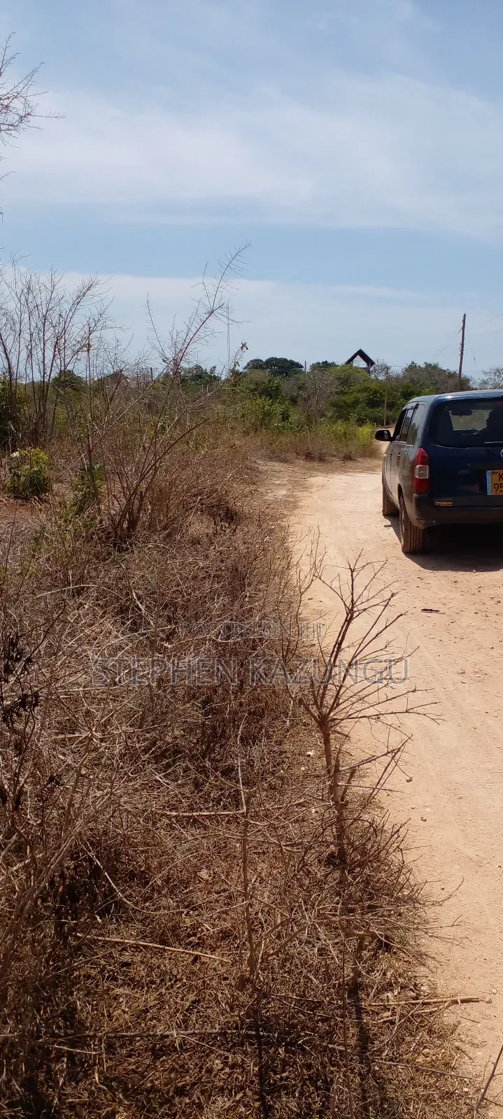 1 Acre Half Plot on Sale in Galu Beach Zone.